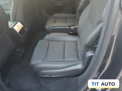 2025 Tesla Model Y L 4